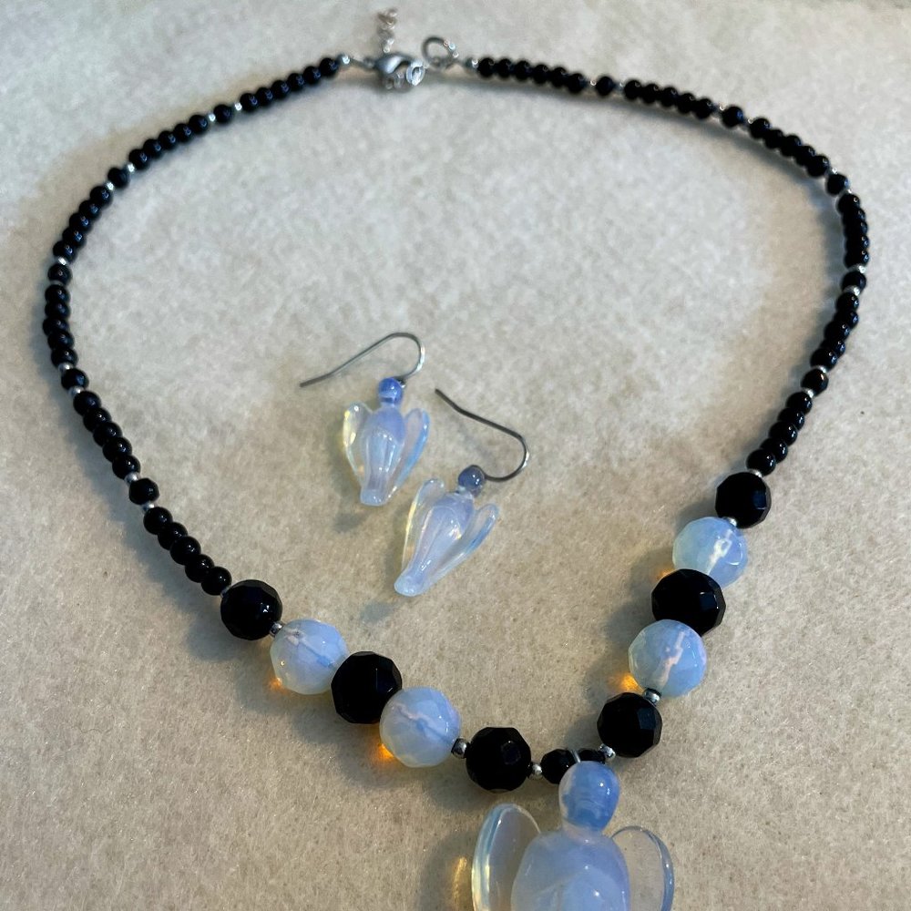 Vintage looking angel and black bead necklace with earrings